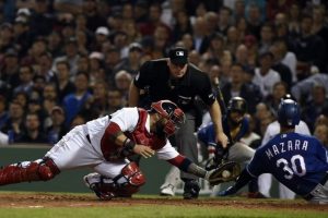 May 23, 2017; Boston, MA, USA; Boston Red Sox catcher Sandy Leon (3) tags out Texas Rangers right fielder Nomar Mazara (30) during the seventh inning at Fenway Park. Mandatory Credit: Bob DeChiara-USA TODAY Sports