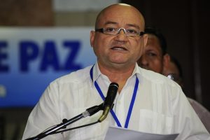 FARC-EP leftist guerrillas commander Antonio Lozada reads a statement during the peace talks with the Colombian government, at the Convention Palace in Havana on March 5, 2015. Colombia's leftist FARC guerrillas said Tuesday they will not sign any peace deal that allows their members to be tried and jailed. Negotiators seeking to end the more than five-decade guerrilla war at talks in Havana are under growing international pressure to guarantee justice for crimes committed during the conflict. AFP PHOTO / Yamil LAGE