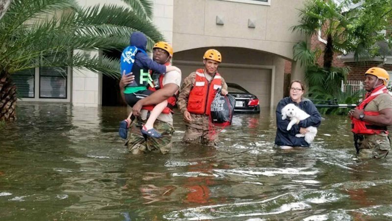 Texas National Guard soldiers assist citizens in heavily flooded areas from the storms of Hurricane Harvey in Houston, Texas, U.S. Aug. 27, 2017. Picture taken August 27, 2017.   Lt. Zachary West/U.S. Texas Military Department/Handout via REUTERS   ATTENTION EDITORS - THIS IMAGE WAS PROVIDED BY A THIRD PARTY. - RTX3DPK4